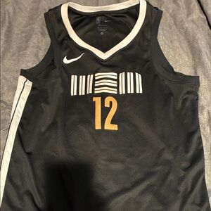 Nike Black and Gold Sports Jersey